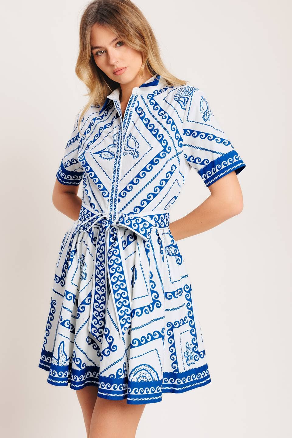 A printed woven mini dress - ID23236