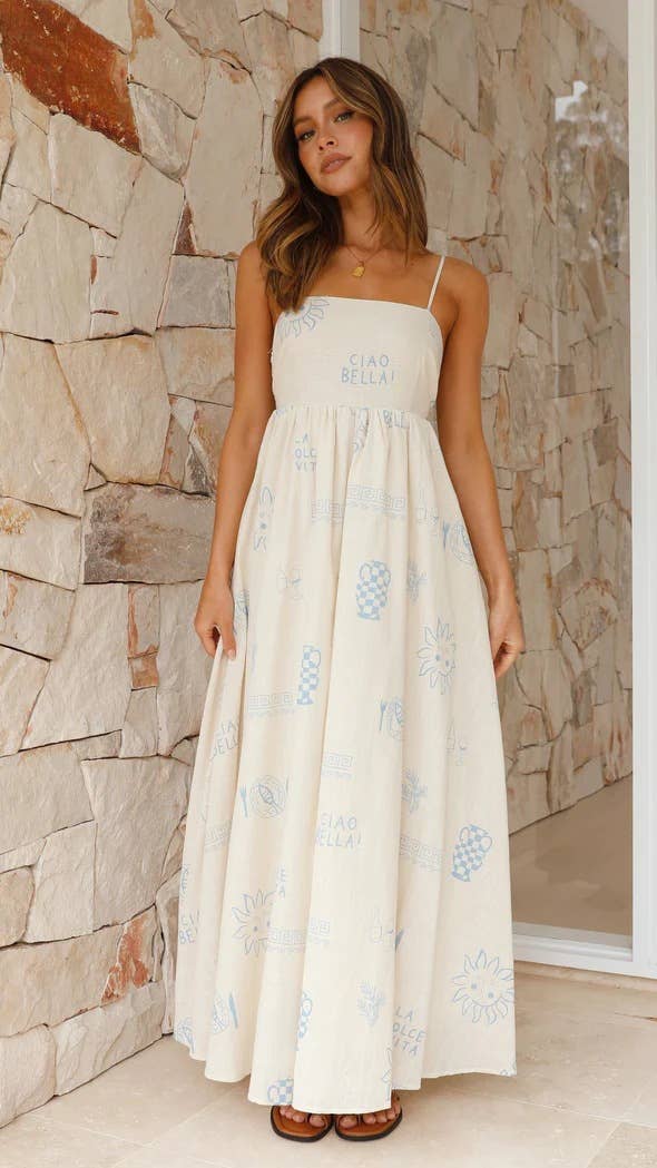 Printed and distinctive back-cut halter dress