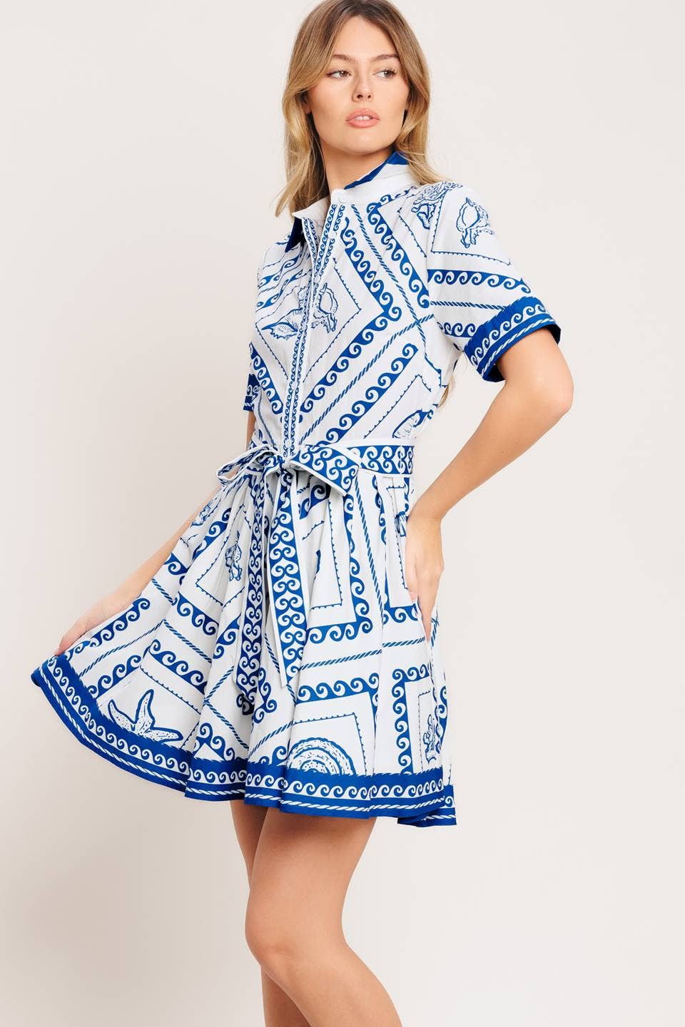 A printed woven mini dress - ID23236