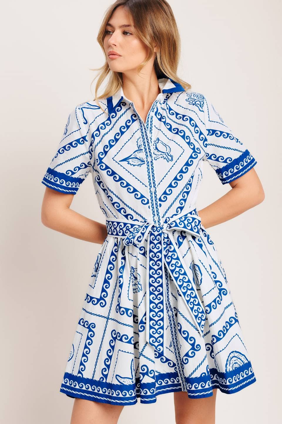 A printed woven mini dress - ID23236
