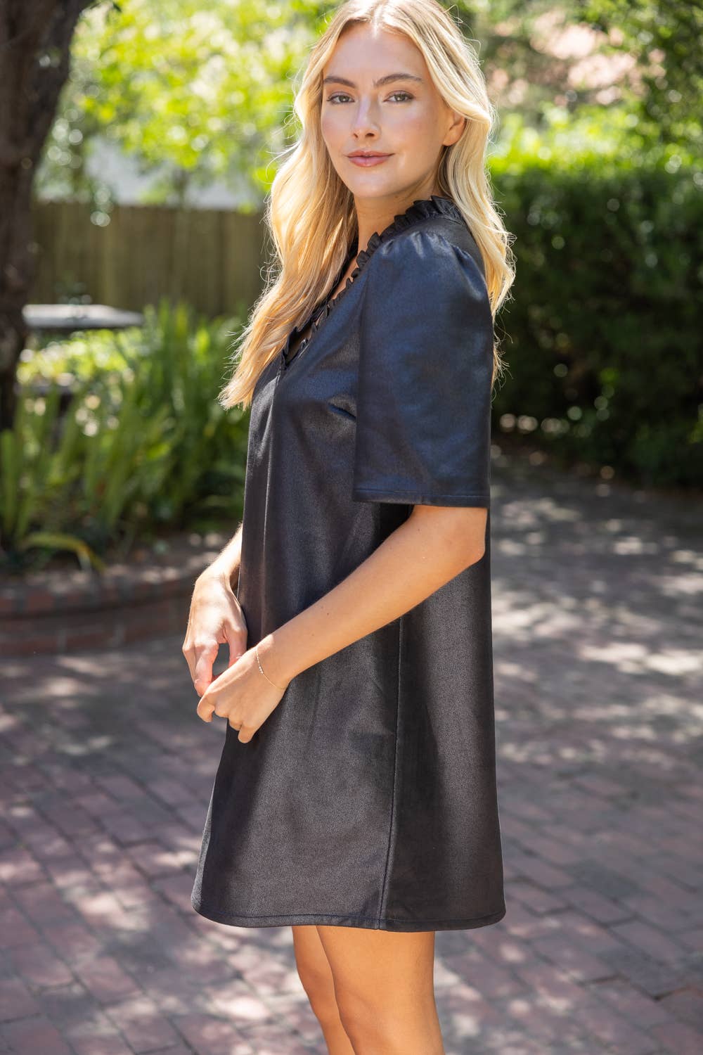 37100 Ruffled V-Neck Solid Faux Leather Shift Dress