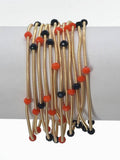 Set of 9 Gold Wired Stretch Bracelets with Navy and Orange 