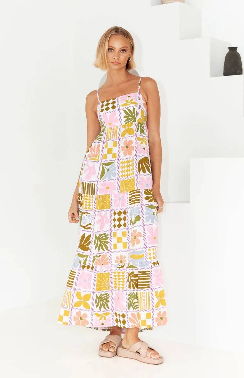 Printed and distinctive back-cut halter dress