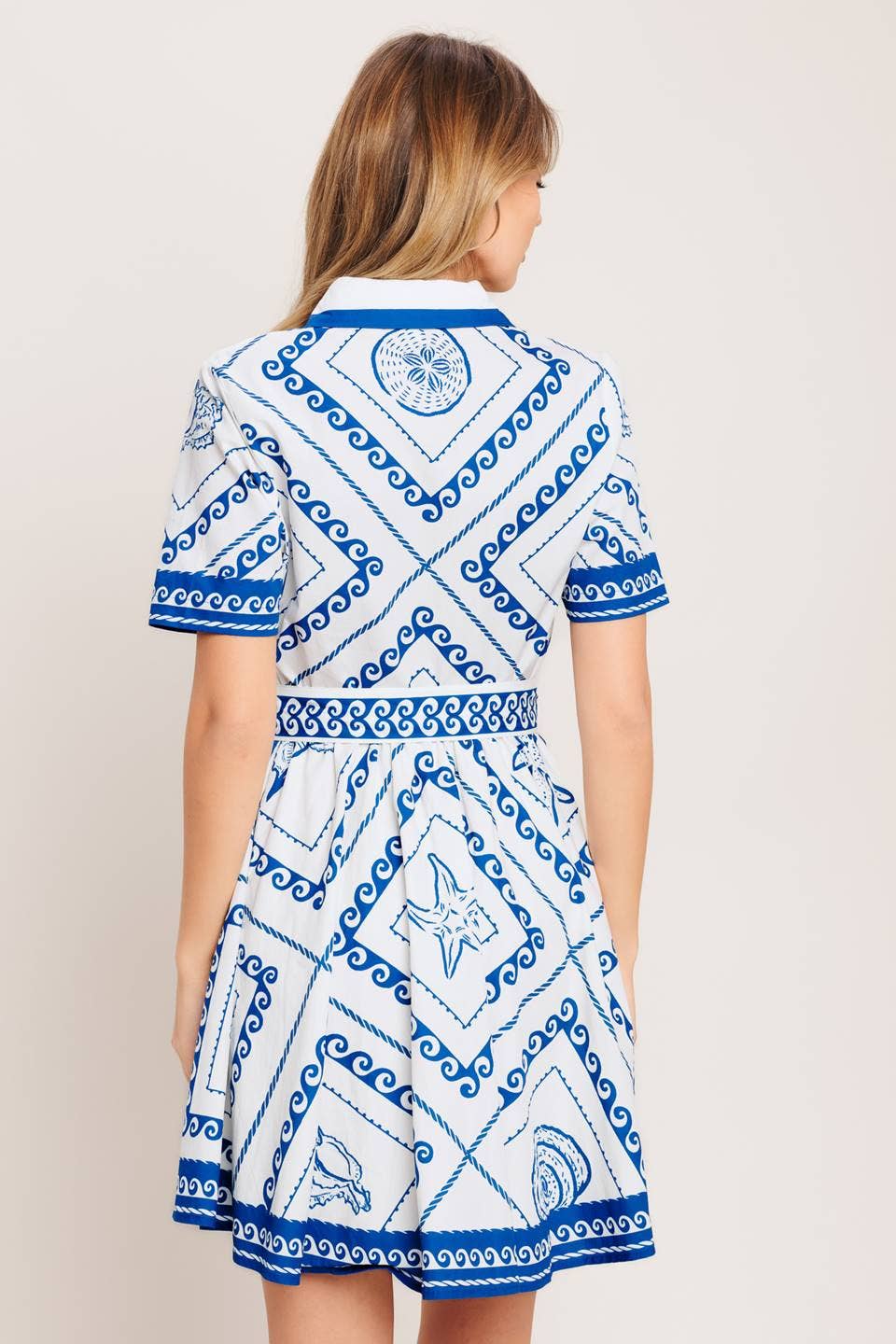 A printed woven mini dress - ID23236